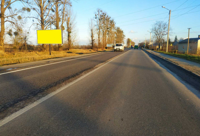 Щит 6x3,  с. Сопошин, виїзд з м. Жовква в напрямку м. Львів, траса Львів- Рава-Руська (М-09), поряд АЗК WOG, пішохідний перехід світлофор, зупинка гром. транспорту