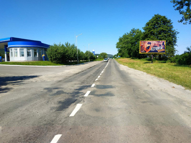 Щит 6x3, м. Золочів, вул. Львівська, виїзд з м. Золочів на м. Львів + АЗК ANP + жовта вітрозахисна люмінесцентна рамка Щит 6x3, м. Золочів, вул. Львівська, виїзд з м. Золочів на м. Львів + АЗК ANP + жовта вітрозахисна люмінесцентна рамка